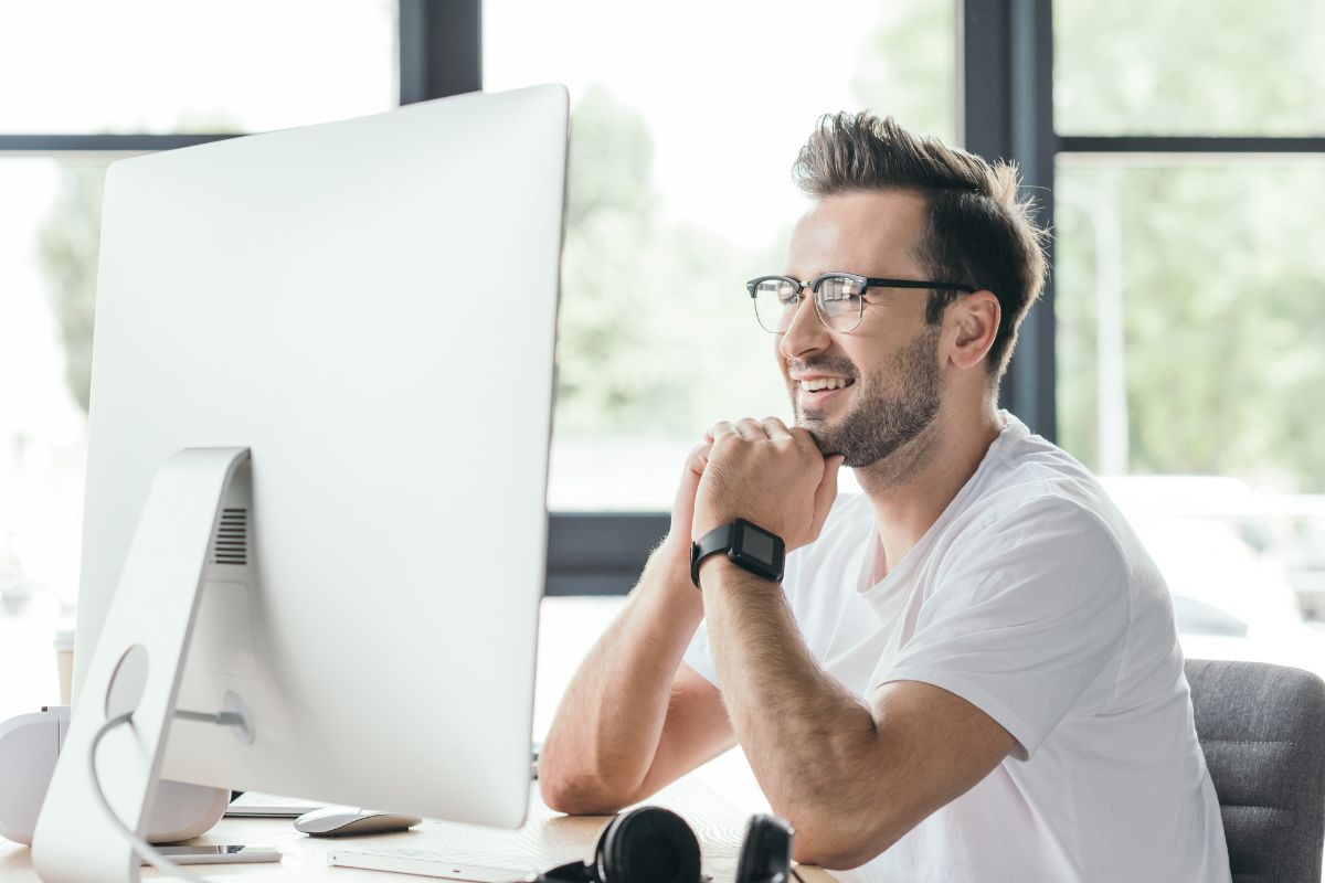 Picture of a man using a computer.