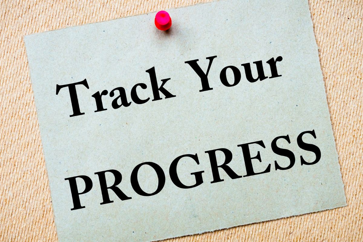 Picture of a paper with Track your progress wording.