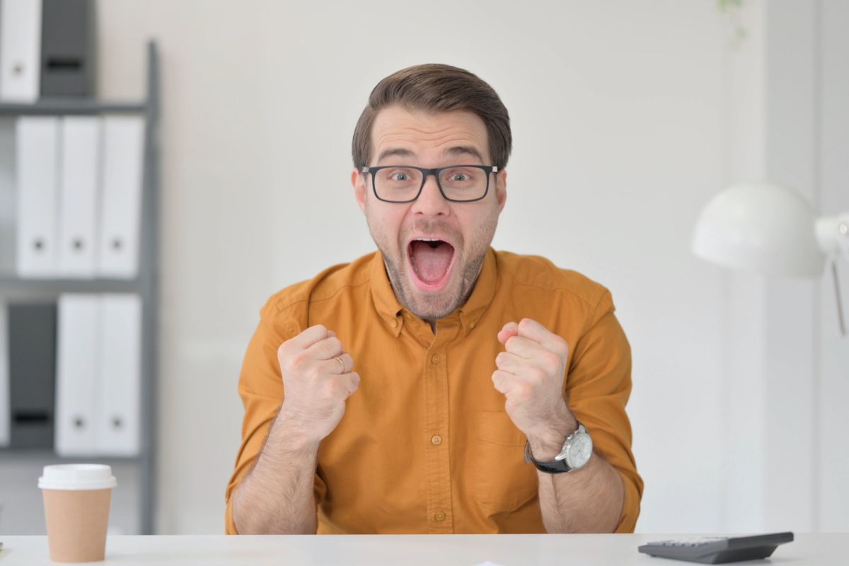 Picture of a man cheering.