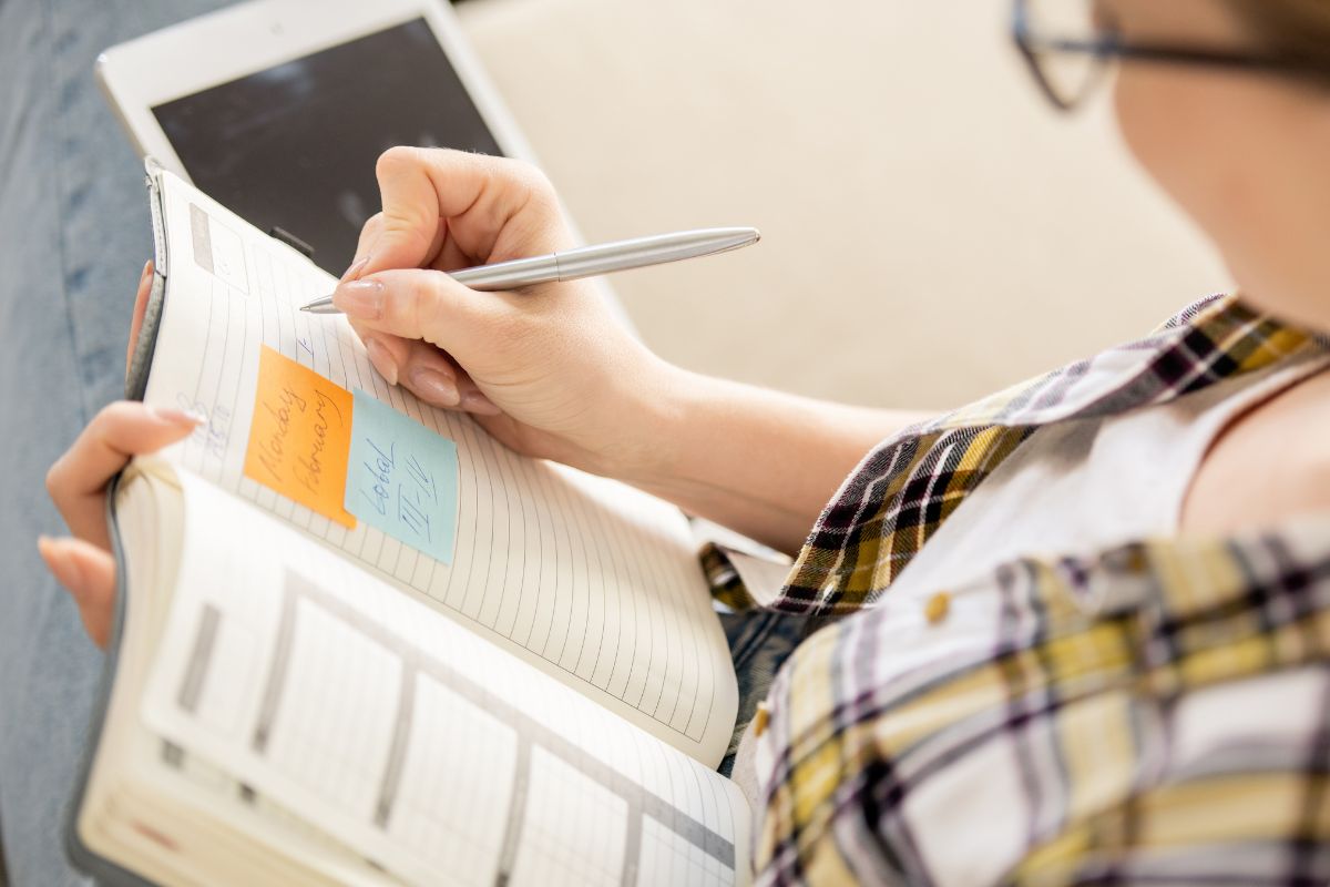 A woman reviewing her goals.