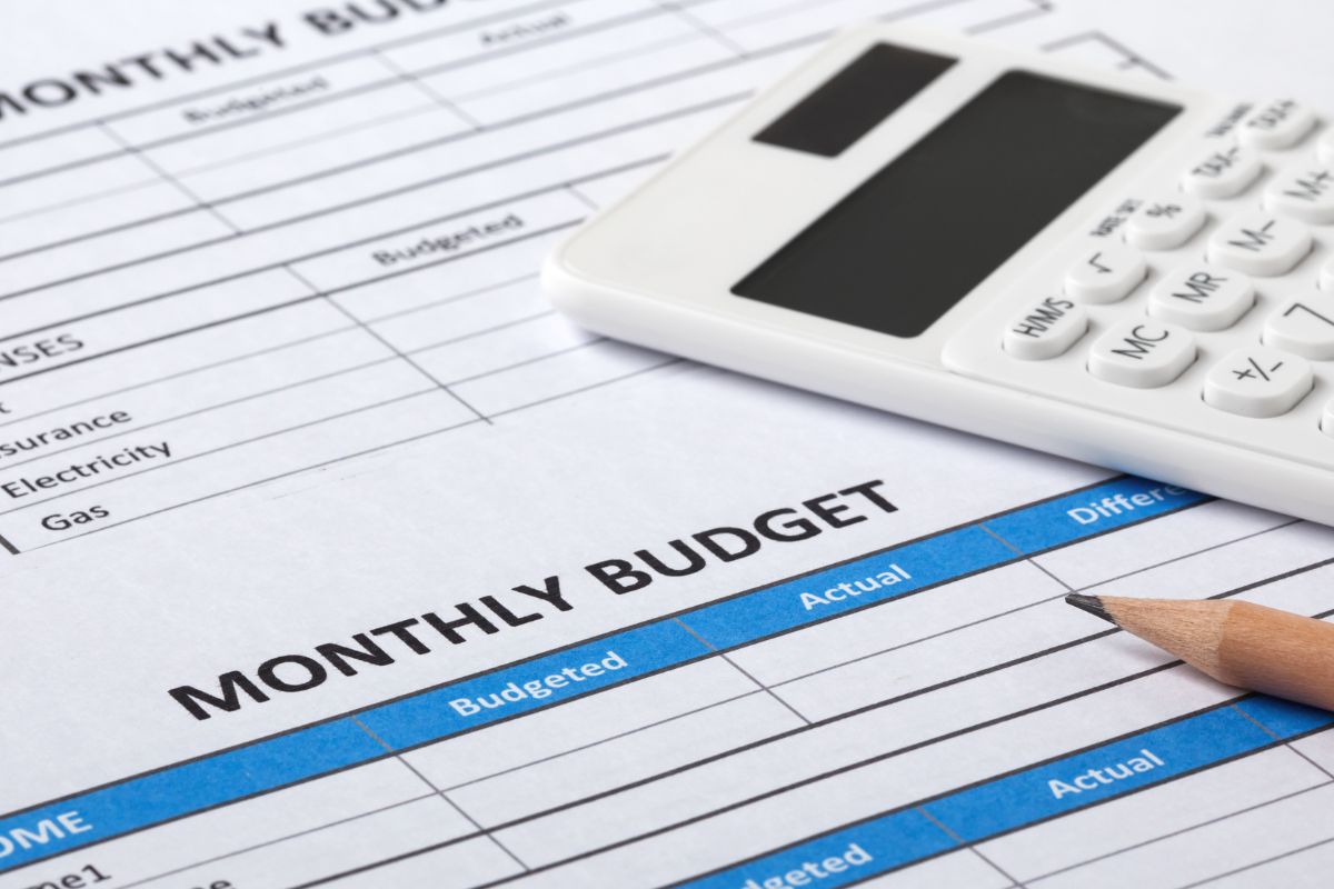 The image shows a monthly budget paper.