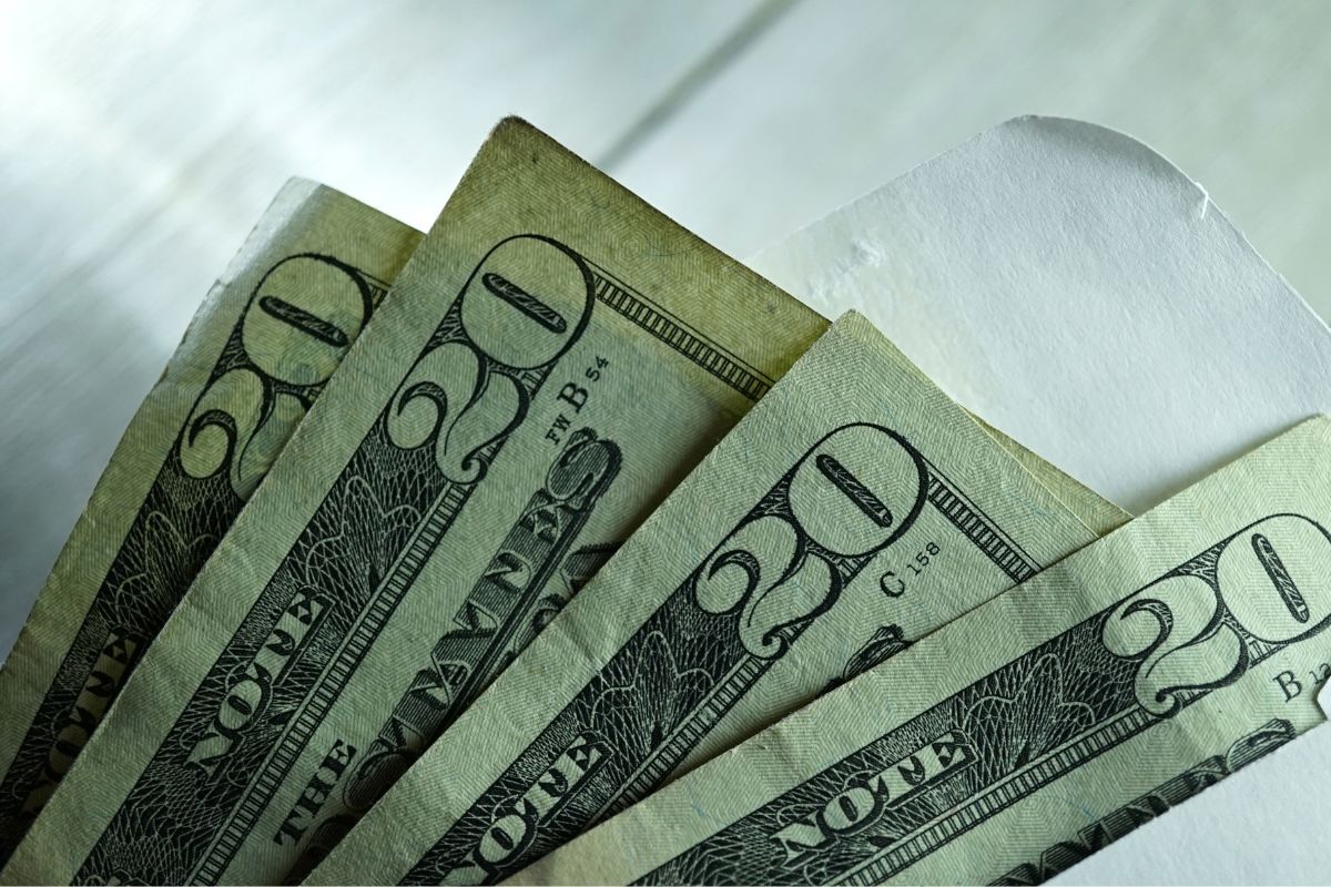 Picture of money in an envelope.