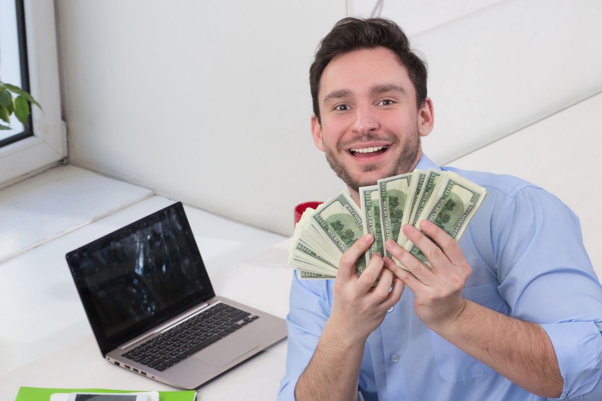 Photo of a man making money online.