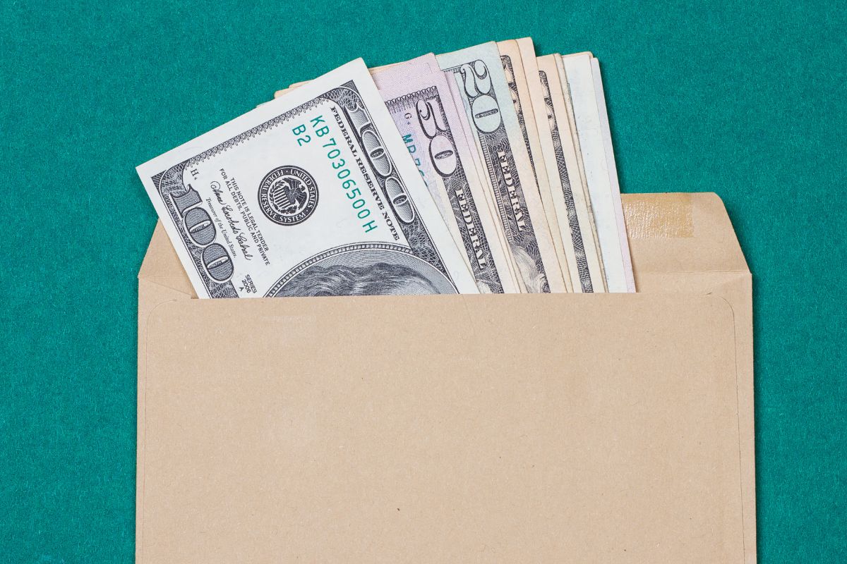 Picture of an envelope with money.