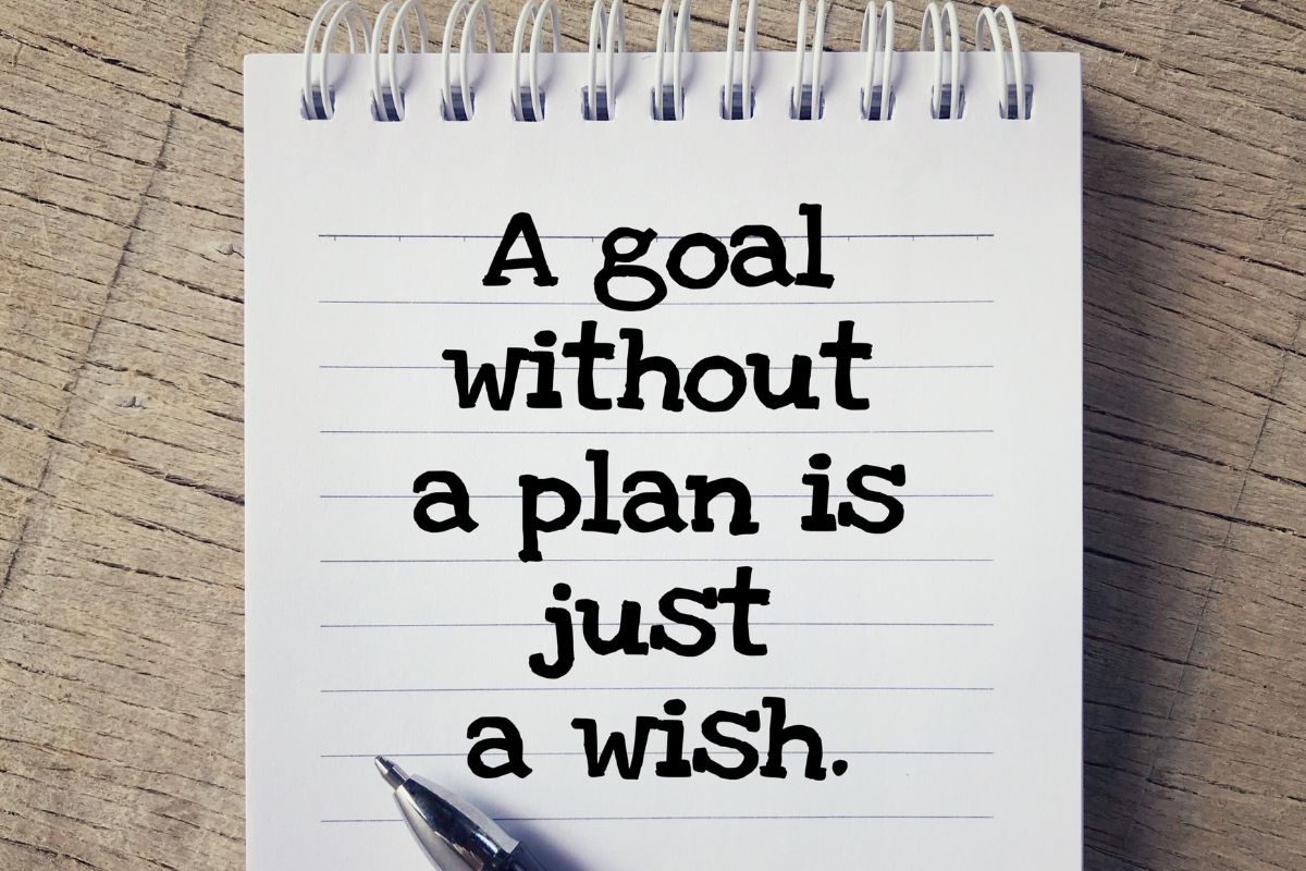 A notebook with a quote.