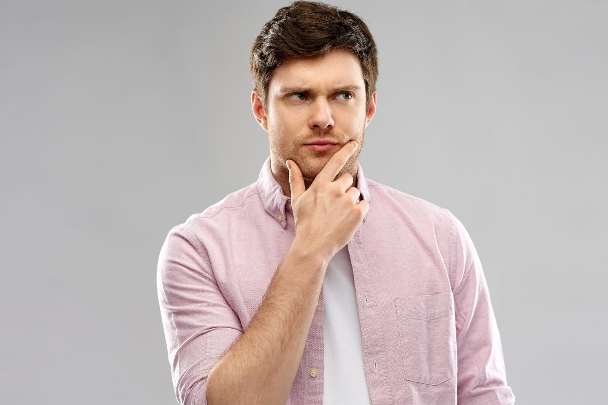 Photo of a man thinking.