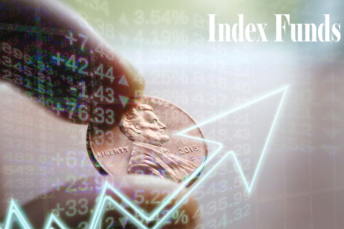 Picture of a man's hand investing in index funds.