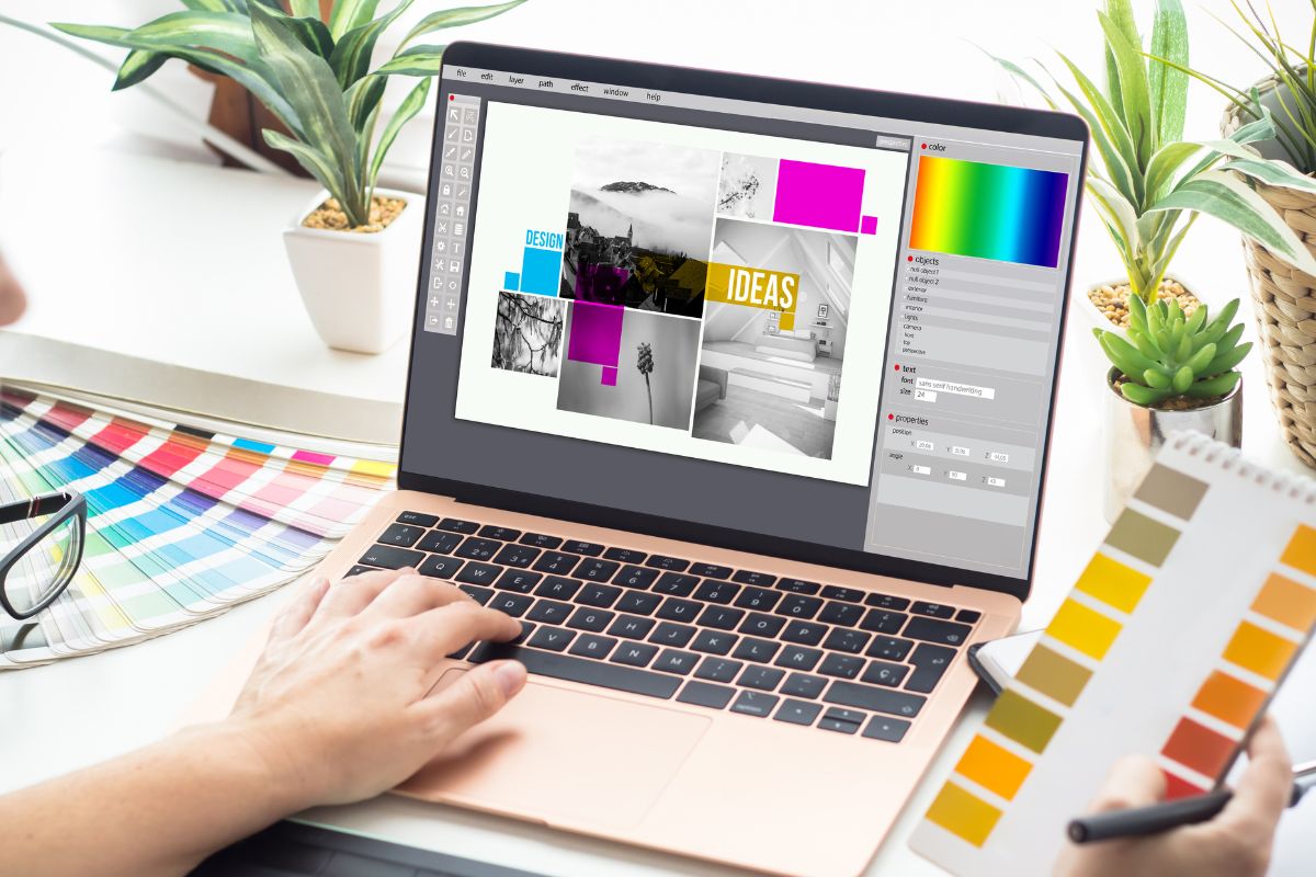Photo of a graphic designer using a laptop.