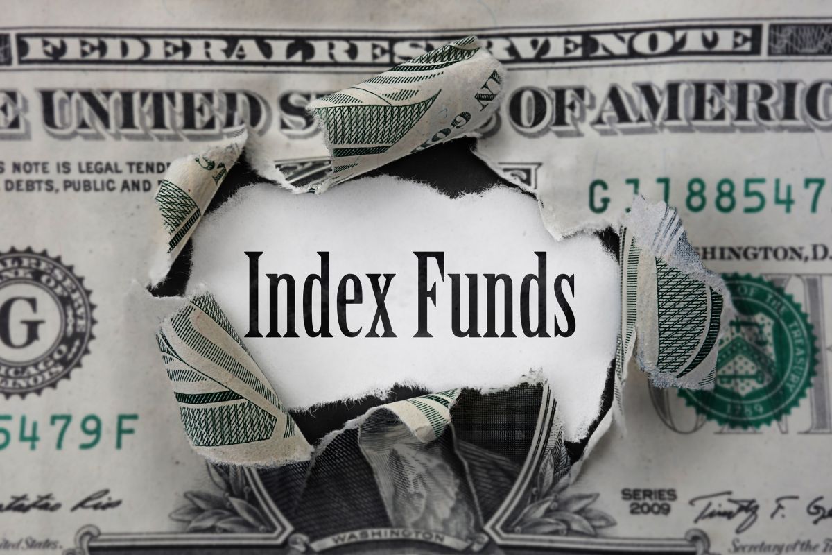 Photo of money and index fund wording.
