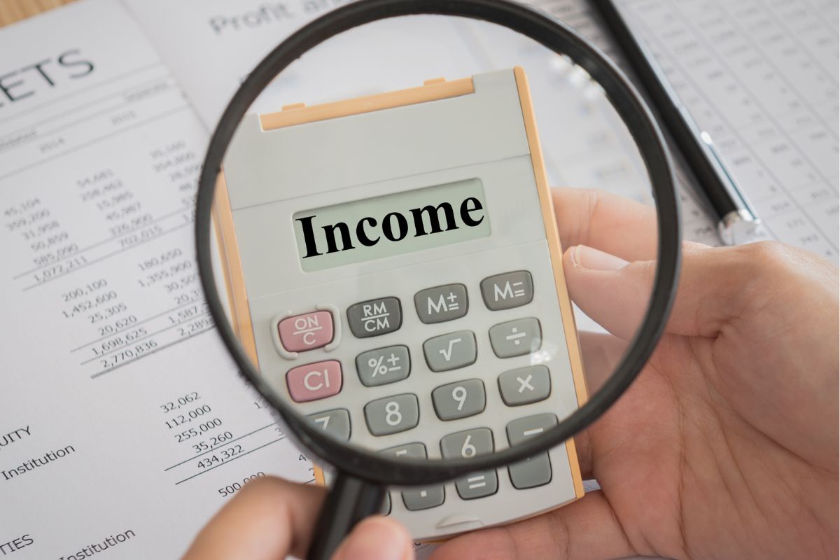 Image of a man's hand listing his income sources.