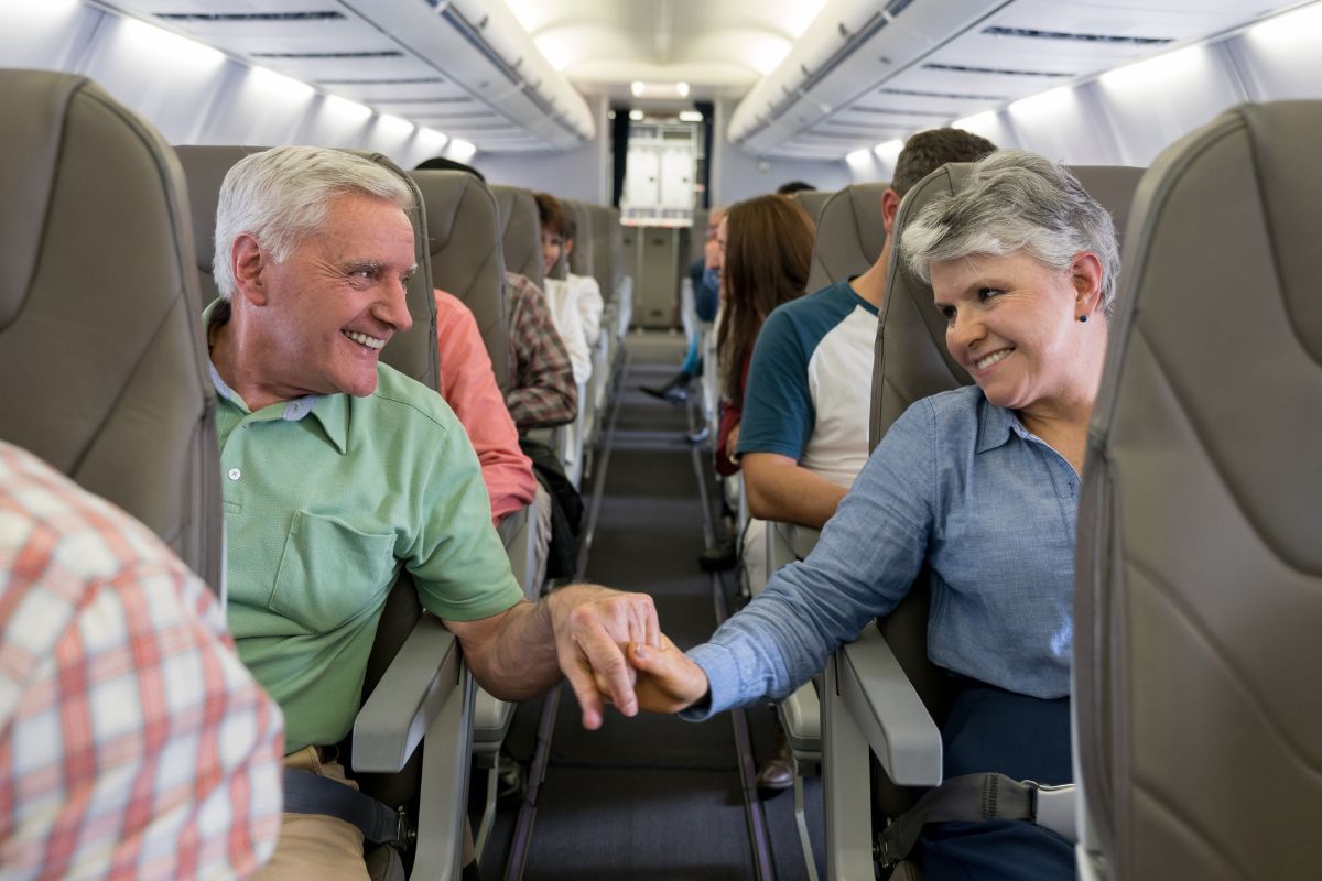 Image of a senior couple on the flight.