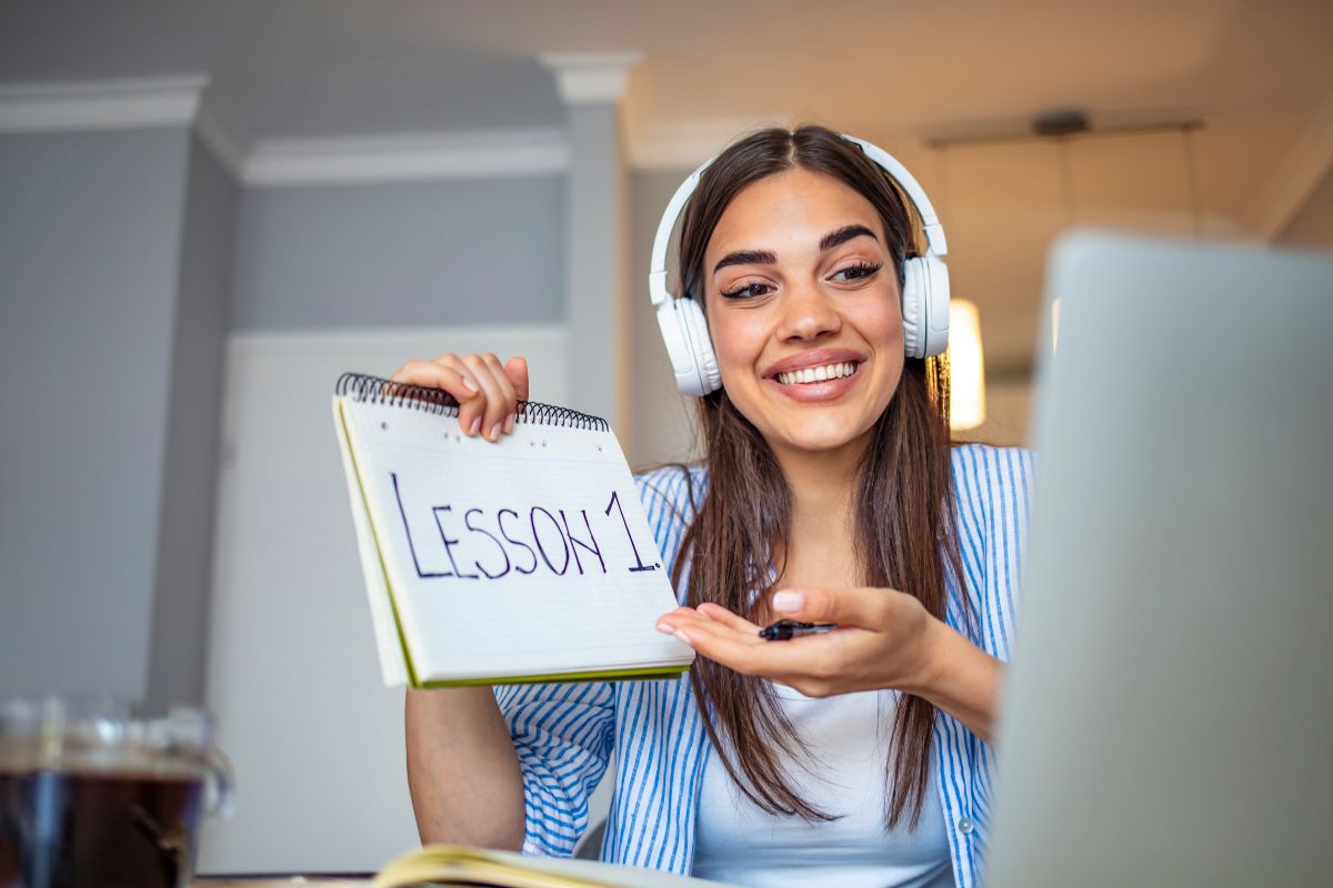 A woman tutoring online.