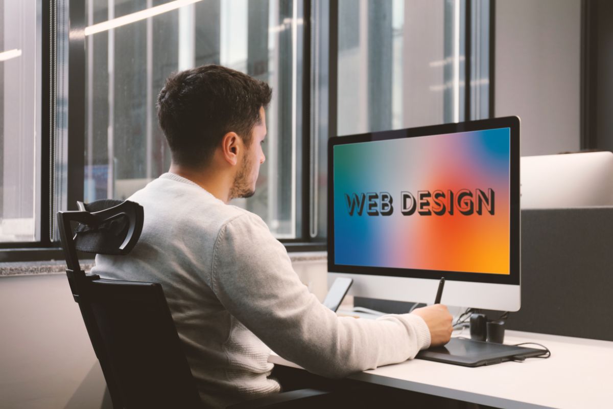 A man working on a web design.