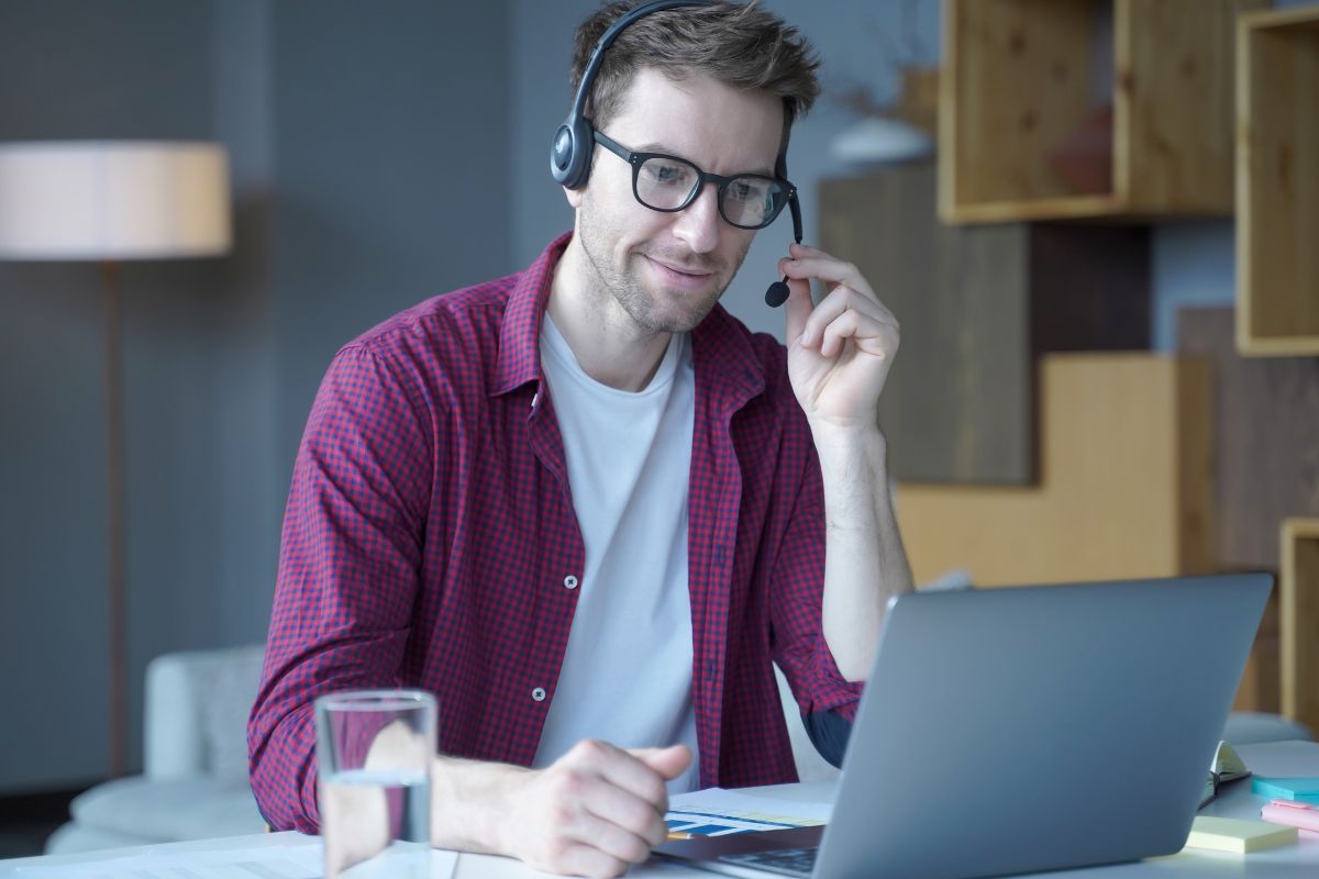 Photo of a man coaching online.