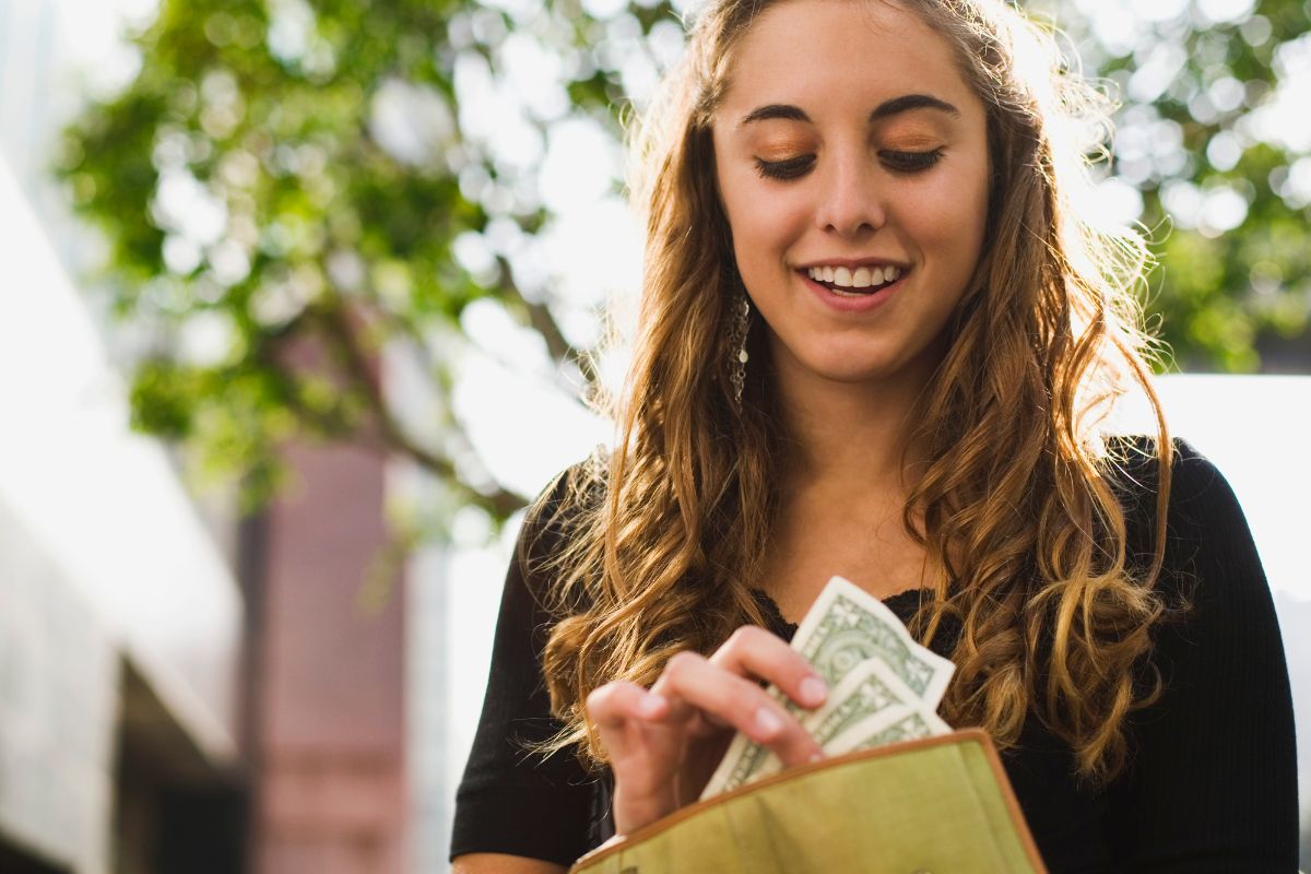 Picture of a woman not spending her money.