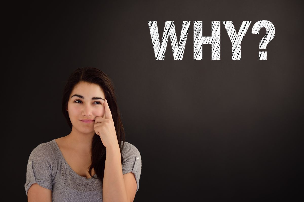 Photo of a woman thinking why.