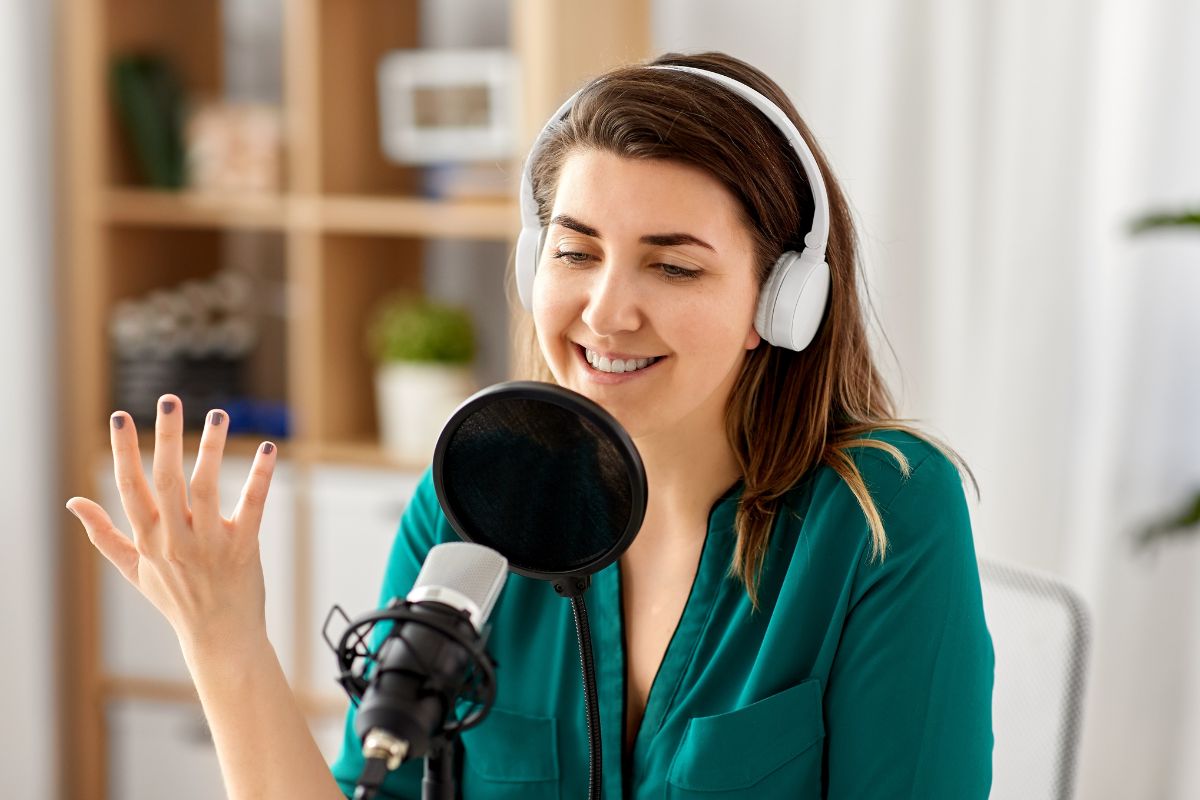 Image of a woman podcasting.