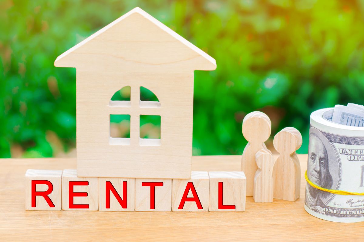 Picture of money and rental wording.