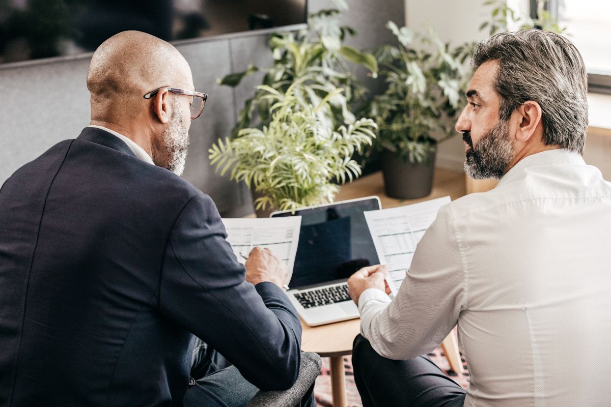Photo of a man consulting with a financial planner.