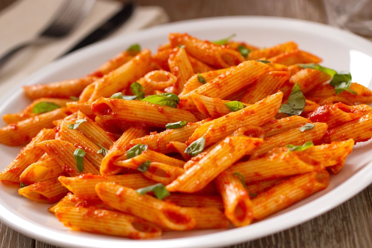 Image of pasta with tomato sauce.
