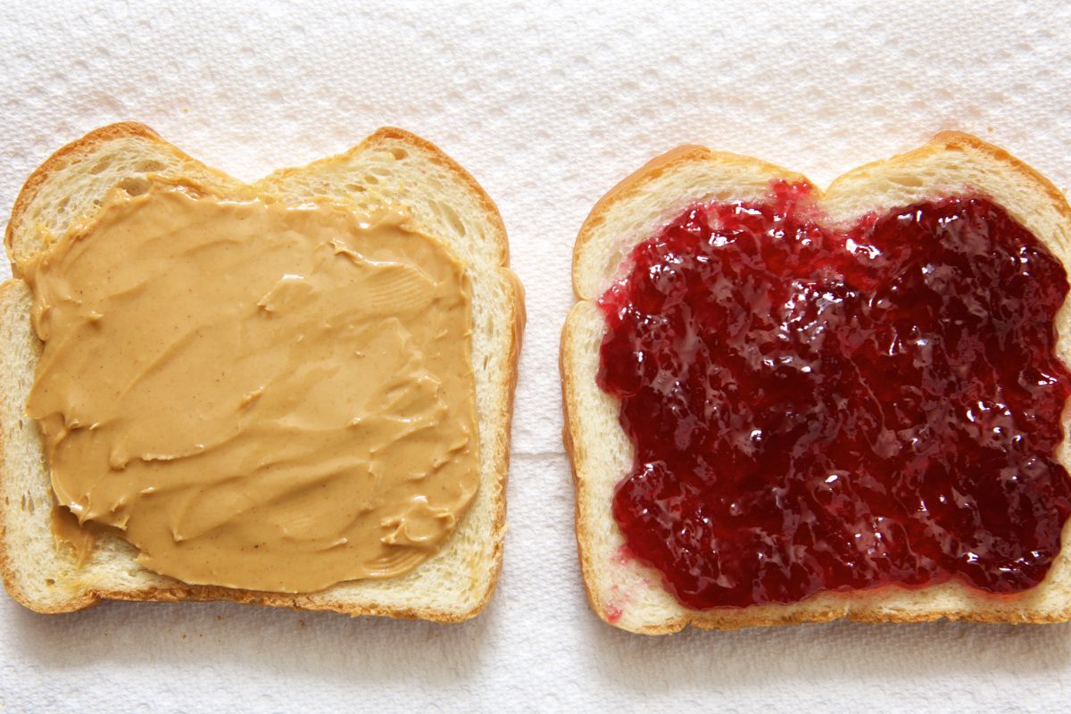 Picture of bread with peanut butter and jelly jam.