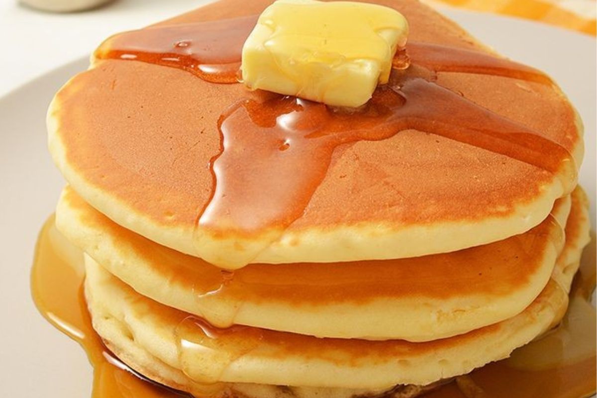 Image of pancakes with butter and syrup.