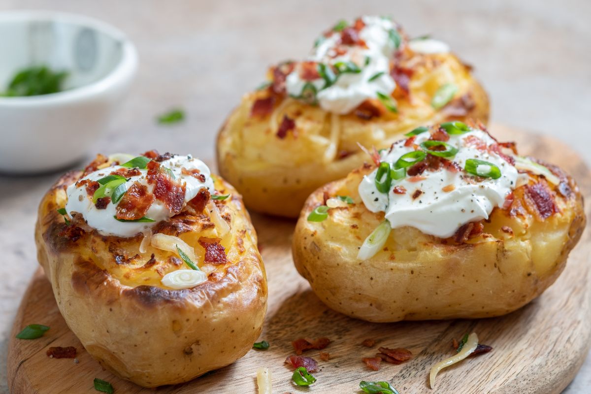 Image of baked potatoes with cream.