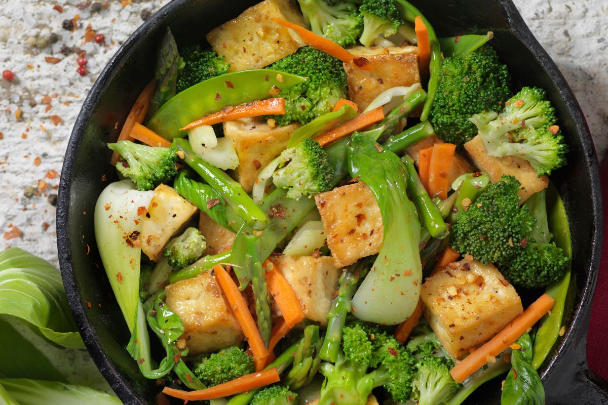 Image of vegetable stir-fry in a pan.