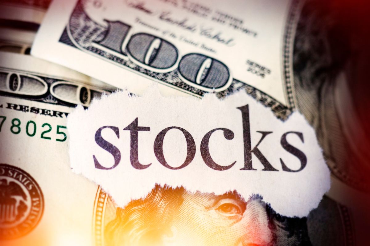 The image shows money for investing in stocks.