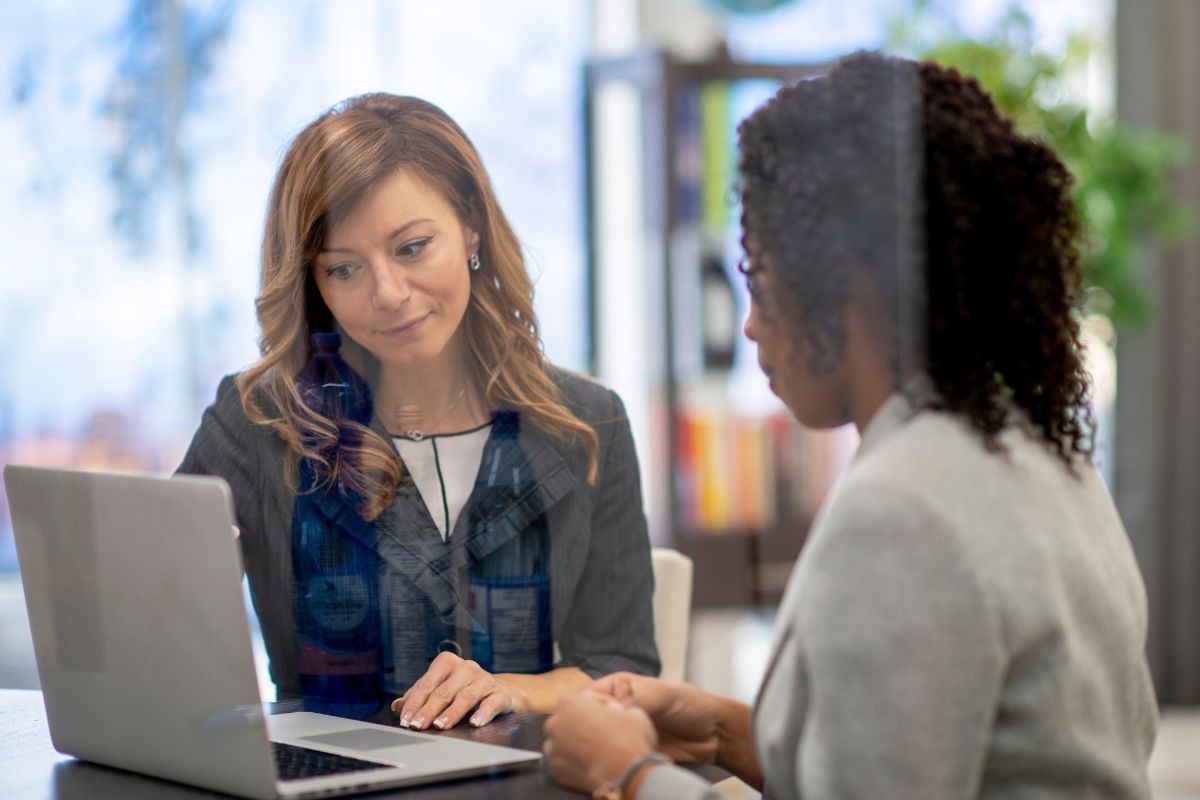 Photo shows a woman consulting her client.