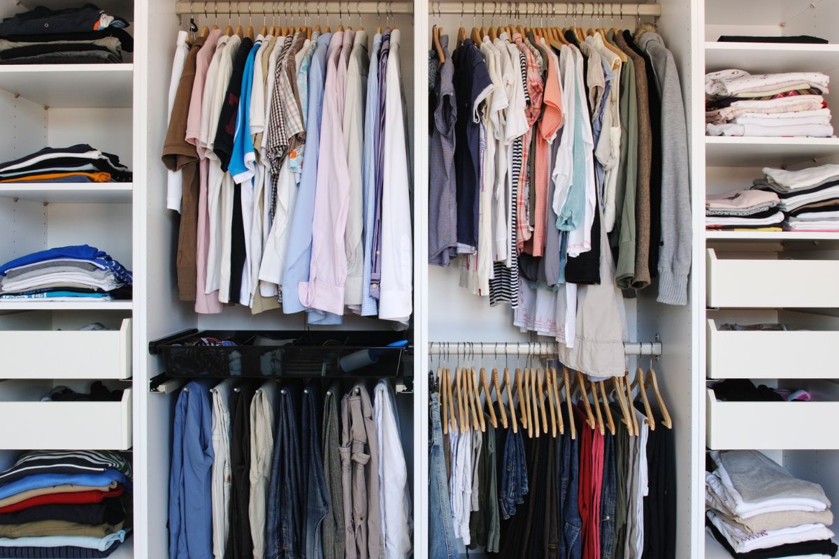 Picture of wardrobe with clothes.