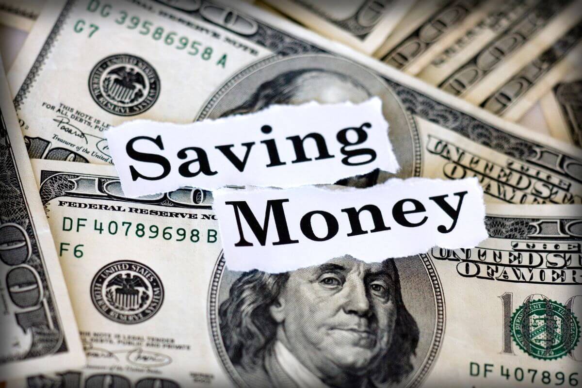 The picture tells about dollar bills and papers with notes indicating to start saving now even few dollars regularly can grow over time.
