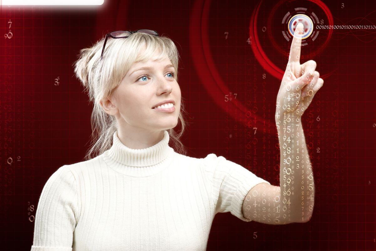 The picture tells about a girl touching the virtual screen to visualize achieving your financial independence daily keeps you motivated and helps turn your goals into reality.