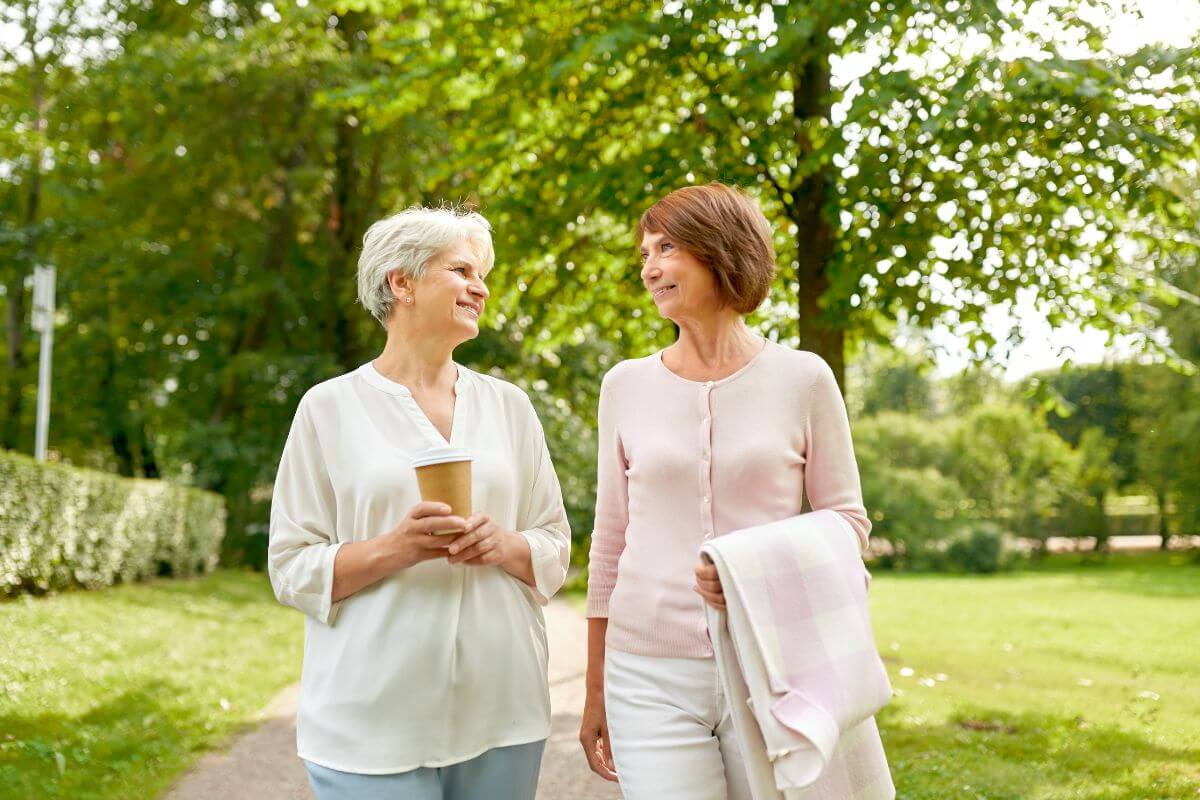 The photo shows old women enjoying the park together referring to retirees enjoying reduced or free admission to parks, museums, or events without putting a strain on your budget.