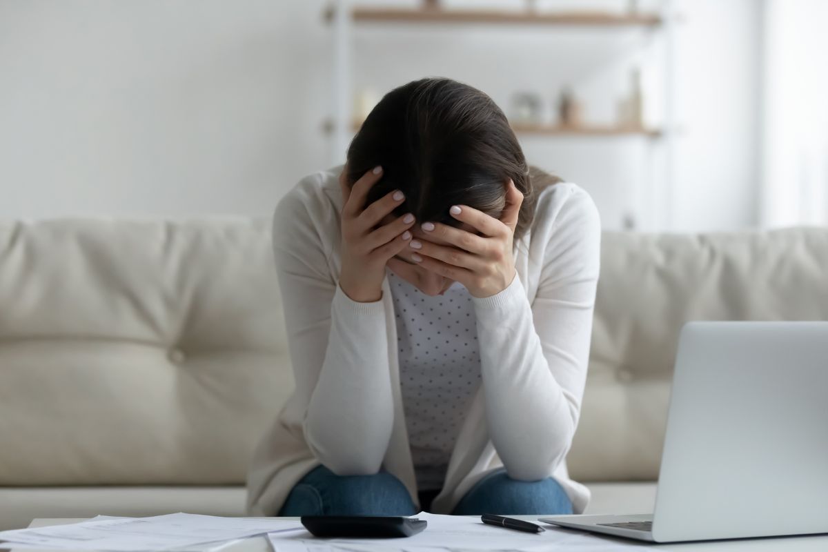 A woman with financial stress.