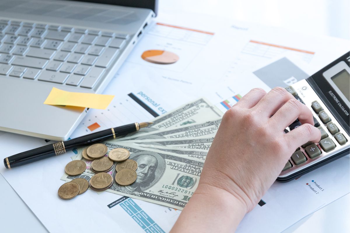 Image of a woman's hand budgeting.