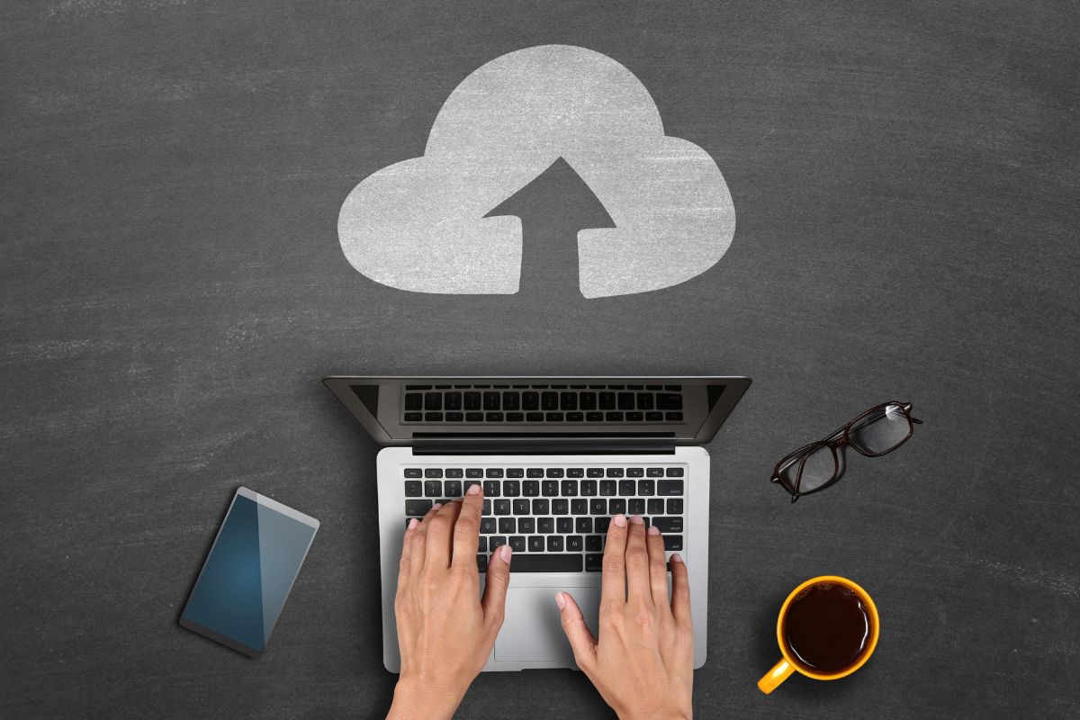 Picture of a woman's hand creating a digital backup.