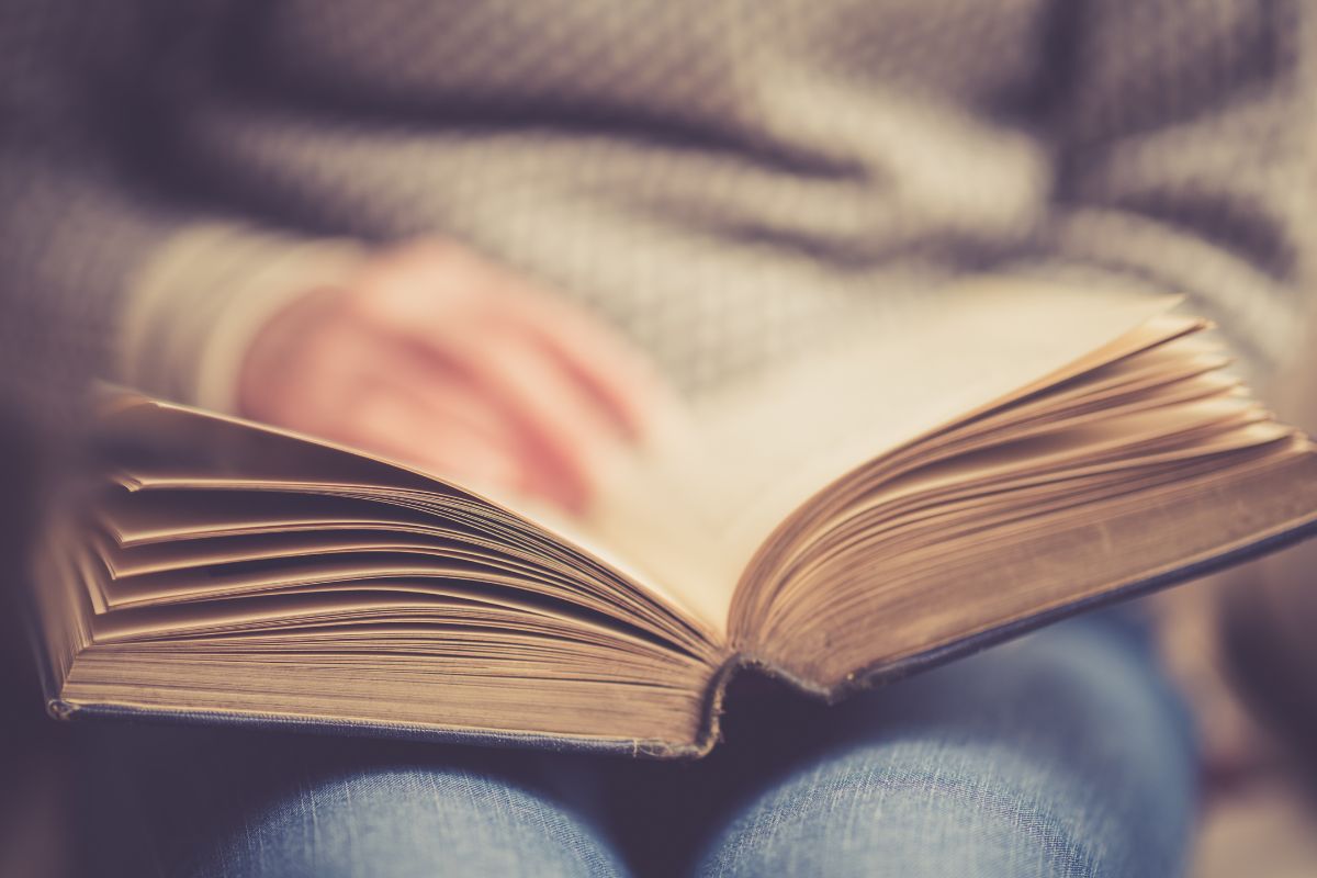 A woman reading a book.