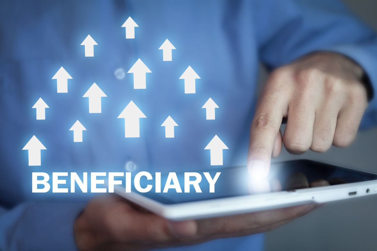 Photo of a man designating beneficiaries.