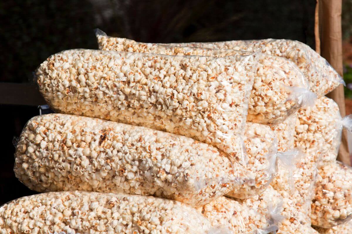 The picture shows bags of popcorn which is much pricier than buying kernels and making it yourself.