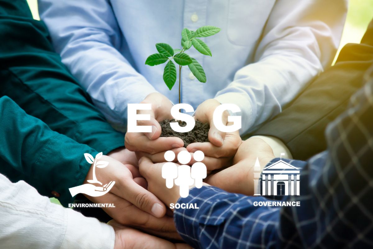 The photo shows a group of people practicing ESG.