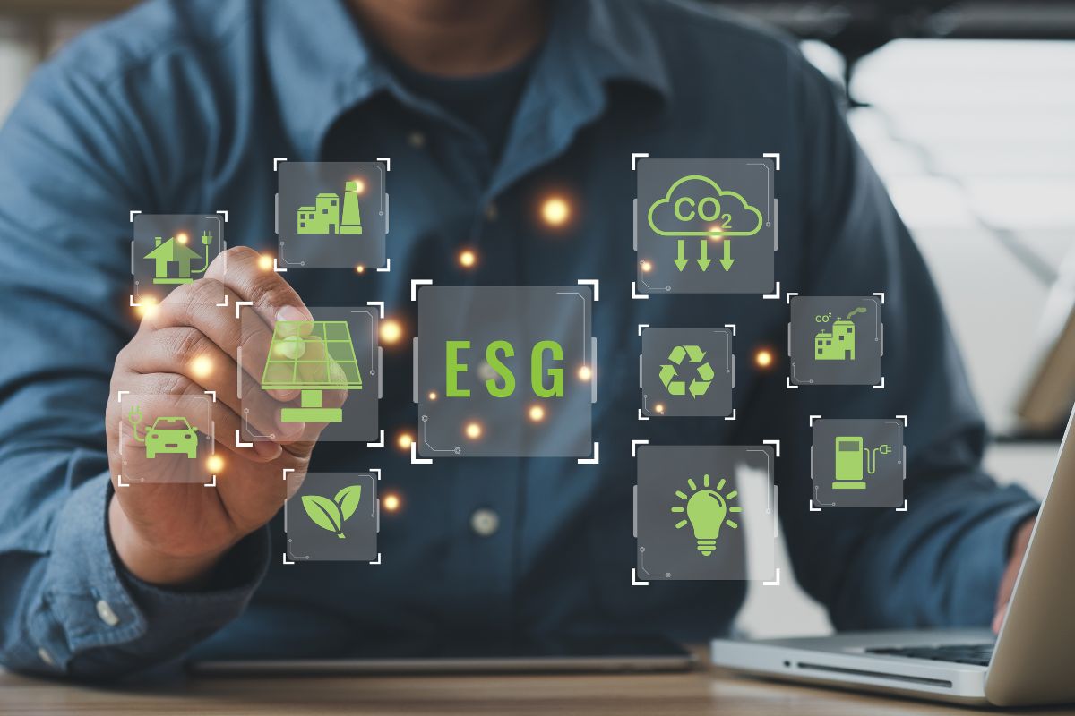 Picture of a man's hand doing research about ESG.