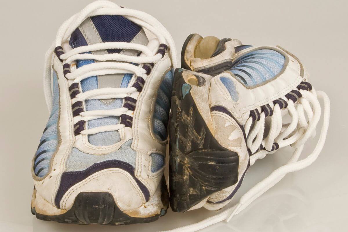The picture shows a worn-out pair of shoes, getting rid of unusable items helps your closets feel organized and purposeful.