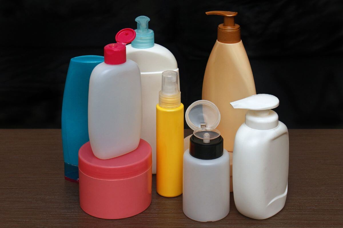 The image shows empty toiletries on the table indicating to clutter them and make your bathroom simpler to use.