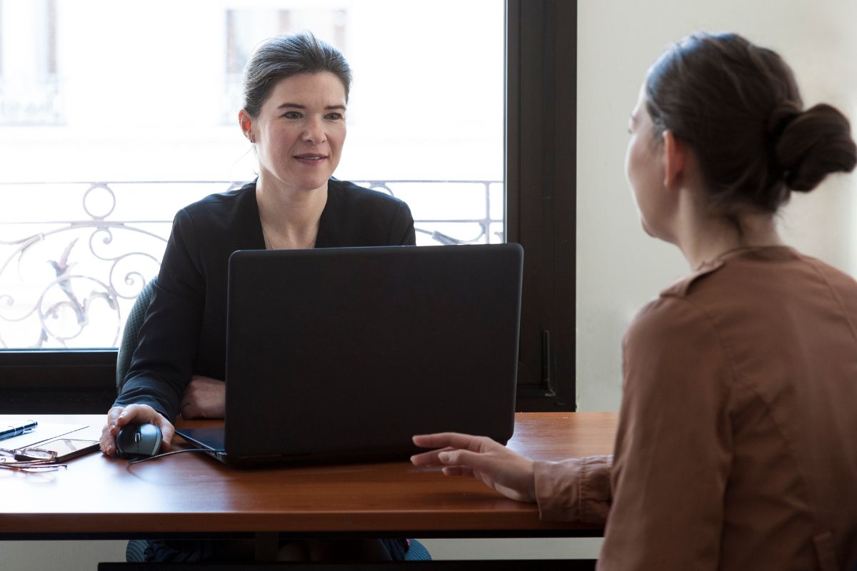 Photo of a woman having a consultation.