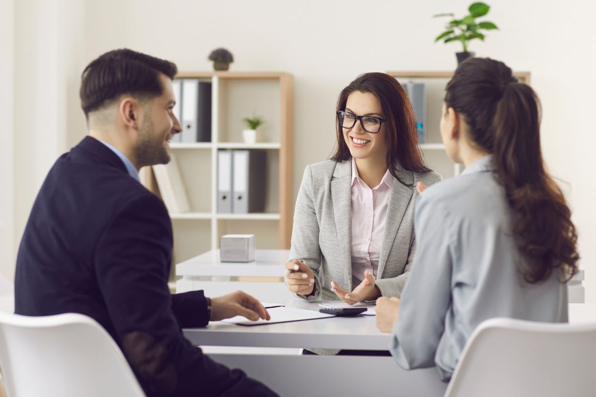 The image shows a group of financial advisors.