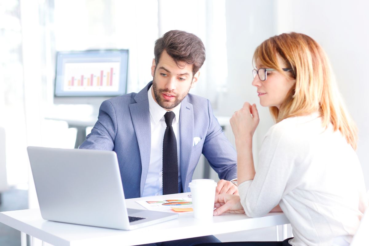 Photo of a financial advisor and his client.