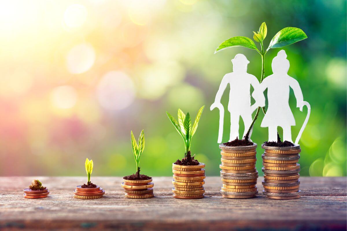 The photo of coin stocks with plants, and a paper couple of senior-figure referring to the current savings rate enough to meet retirement goals helps you estimate if you're saving enough.