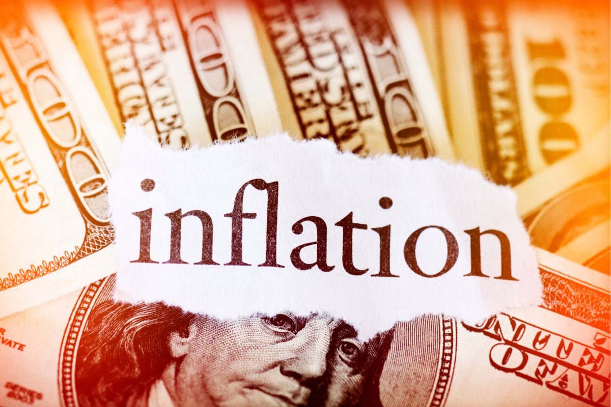 Image of money and inflation wording on a paper.
