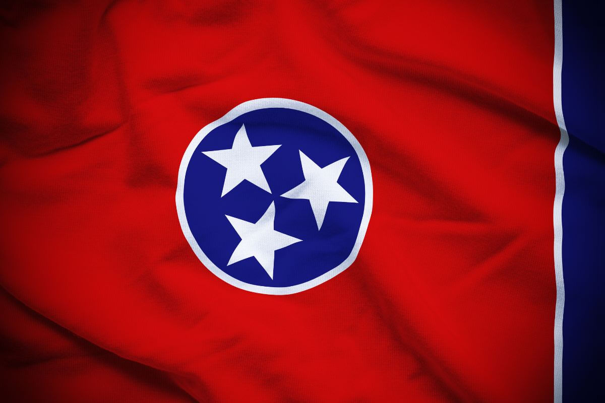 The image tells about a Tennessee state flag referring to they support financial independence by reducing the taxes on your retirement income.